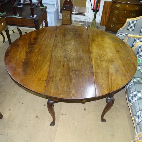 2024 - A Georgian mahogany oval drop-leaf dining table, on cabriole legs with spade feet. 139x73x47cm (exte... 