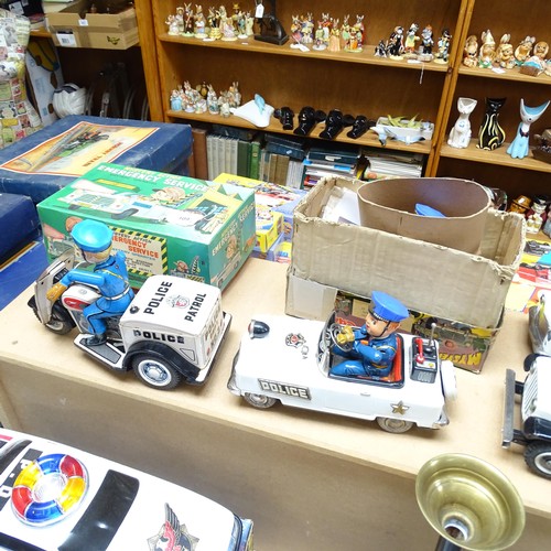 109 - A quantity of Vintage tinplate battery operated Emergency Service vehicles, including a tinplate Pol... 