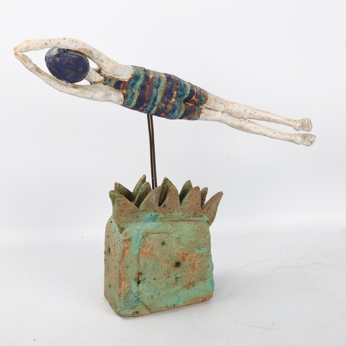 501 - Jane Muir, studio ceramic sculpture of a swimmer in waves, pen signed to base, height 29cm, length 3... 