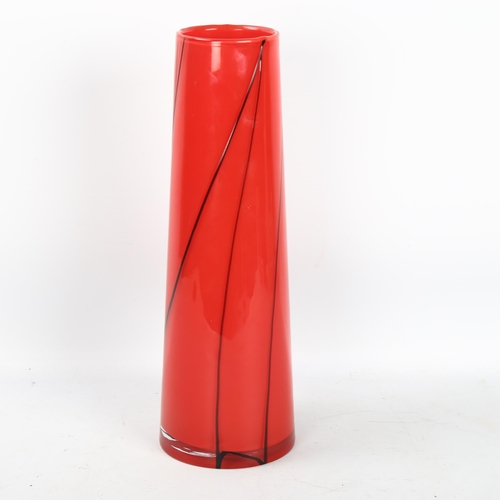 571 - Anna Ehrner for Kosta Boda, a large red glass vase, signed to base, Nr 7040412, with original label,... 