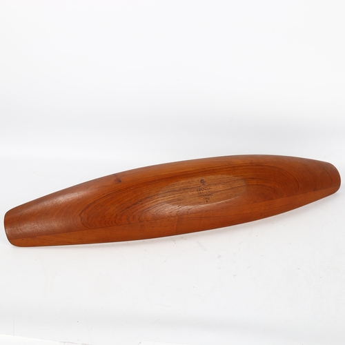 588 - Jens Quistgaard for Dansk Designs, a staved teak longboat styled fruit bowl, 1960s' design, branded ... 