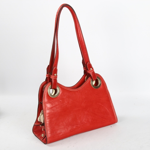 283 - Lancel Paris red leather handbag, length 28cm