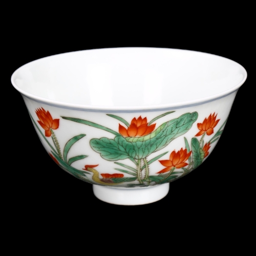 291 - A Chinese porcelain bowl with painted duck and lily flower designs, Qianlong seal mark under, diamet... 