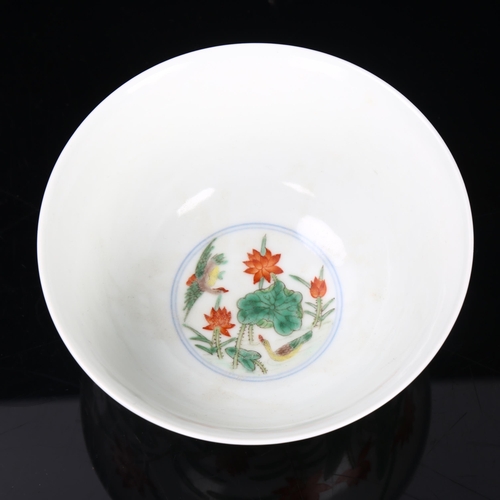 291 - A Chinese porcelain bowl with painted duck and lily flower designs, Qianlong seal mark under, diamet... 