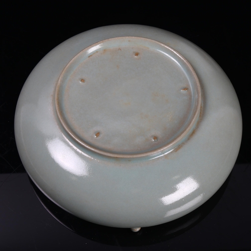 294 - A Chinese celadon glaze porcelain bowl with impressed text inscription, diameter 19cm