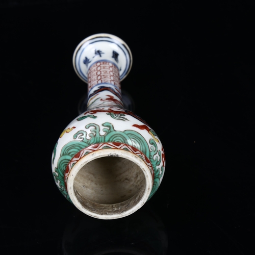 295 - A Chinese porcelain handle with painted sea dragon design, length 14cm