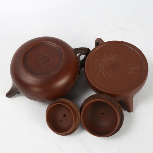 296 - A Chinese Yixing style teapot with monkey knop, character marks to base and sides, height 12cm