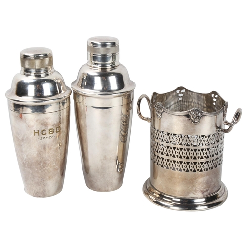 297 - 2 silver plated cocktail shakers, and a plated wine bottle holder (3)