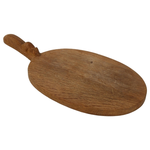 304 - Robert Mouseman Thompson, oak cheese board with carved mouse design handle, length 40cm