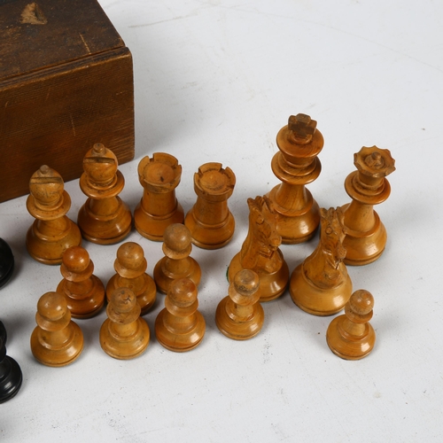 305 - A boxwood and ebonised Staunton pattern chess set, King height 6.5cm, with box