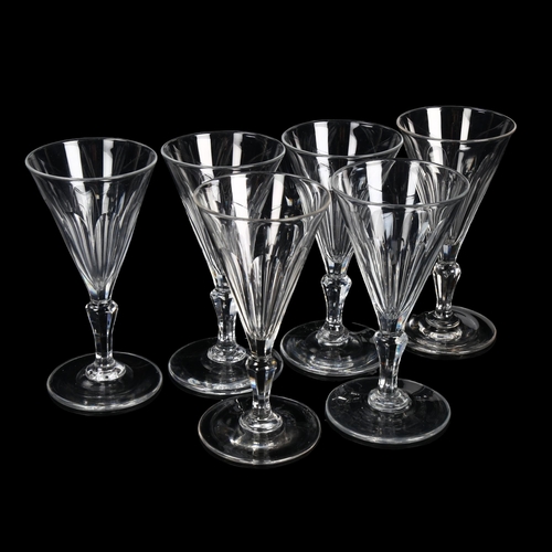 306 - A set of 6 funnel-shaped wine glasses with slice-cut bowls, height 13cm