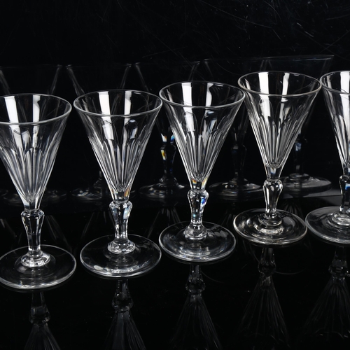 306 - A set of 6 funnel-shaped wine glasses with slice-cut bowls, height 13cm