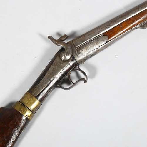 320 - A 19th century poacher's rifle with 2-section barrel, barrel length 72cm