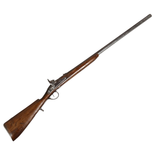 322 - A 19th century percussion rifle, barrel length 83cm