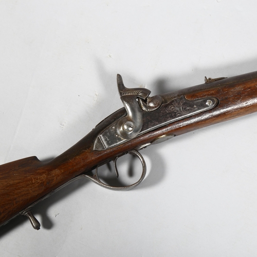 322 - A 19th century percussion rifle, barrel length 83cm