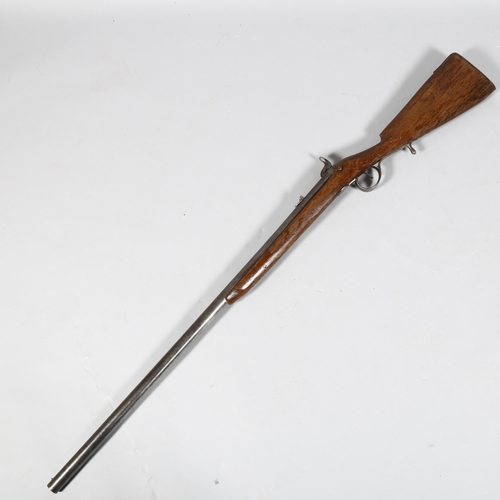 322 - A 19th century percussion rifle, barrel length 83cm