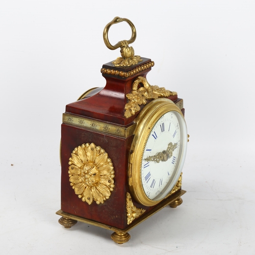 323 - A 19th century tortoiseshell and ormolu-mounted travelling clock, with enamel dial and 8-day movemen... 