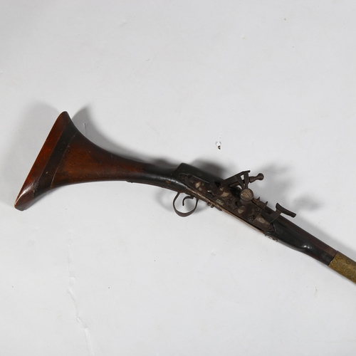 105 - An 18th century Afghan flintlock camel rifle, length 157cm