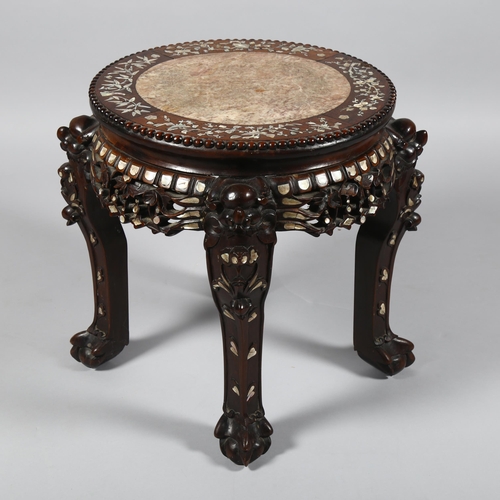 12 - A 19th century Chinese hardwood and mother-of-pearl inlaid circular table, with inset marble top, ca... 