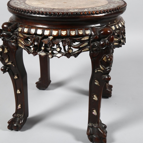 12 - A 19th century Chinese hardwood and mother-of-pearl inlaid circular table, with inset marble top, ca... 