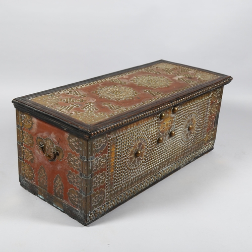 15 - 18th century Continental hardwood chest, with allover brass-studded decoration and applied pierced b... 