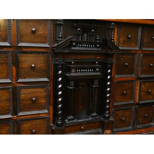 18 - An 18th century Continental rosewood cabinet on stand, possibly Spanish or Portuguese, the central A... 
