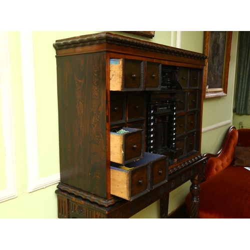 18 - An 18th century Continental rosewood cabinet on stand, possibly Spanish or Portuguese, the central A... 