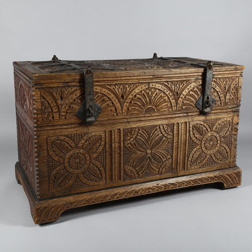 2 - 18th century Continental oak chest, heavy iron strapwork hinges and hasps to the lid, allover chip c... 