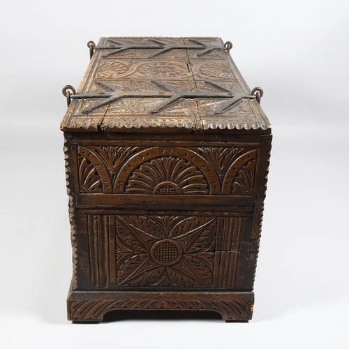2 - 18th century Continental oak chest, heavy iron strapwork hinges and hasps to the lid, allover chip c... 