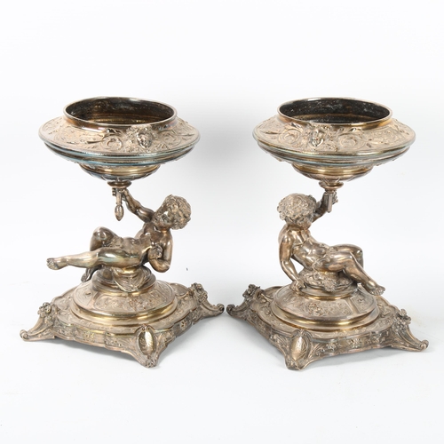 39 - ELKINGTON & CO - a pair of 19th century silver plate table centres, circa 1883, Bacchanalian putti s... 