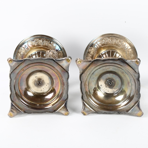 39 - ELKINGTON & CO - a pair of 19th century silver plate table centres, circa 1883, Bacchanalian putti s... 