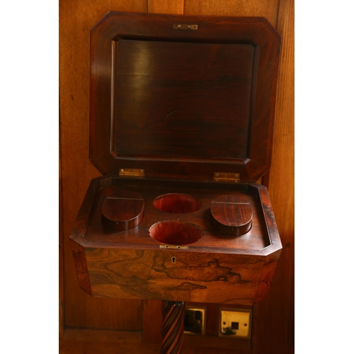 40 - A Regency rosewood teapoy, square canted form with hinged cover opening to reveal fitted interior wi... 