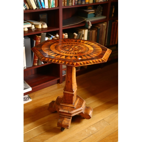 53 - A 19th century Italian parquetry specimen wood tilt-top octagonal wine table, with star and sun moti... 