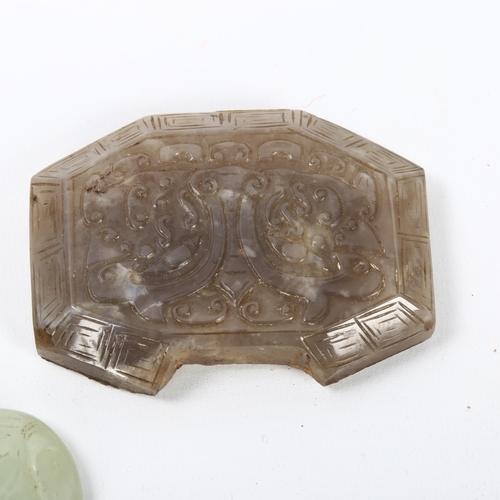 56 - A Chinese carved jade elephant amulet, and a lavender jade furniture mount, width 9cm (2)