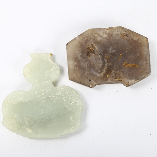 56 - A Chinese carved jade elephant amulet, and a lavender jade furniture mount, width 9cm (2)