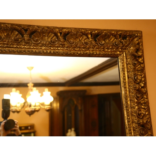 62 - A large gilt-gesso foliate rectangular wall mirror, overall 85cm x 98cm