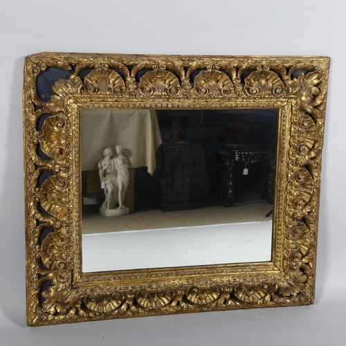 62 - A large gilt-gesso foliate rectangular wall mirror, overall 85cm x 98cm