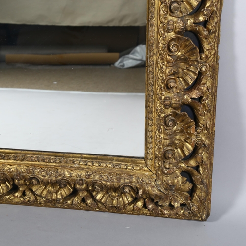 62 - A large gilt-gesso foliate rectangular wall mirror, overall 85cm x 98cm