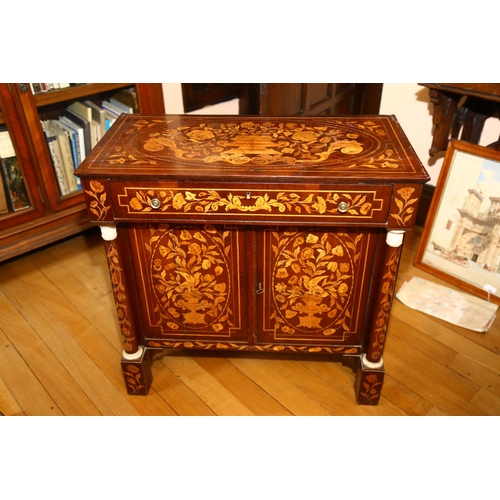 65 - A 19th century Dutch marquetry inlaid walnut sideboard, the top decorated with flowing basket of flo... 