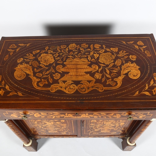 65 - A 19th century Dutch marquetry inlaid walnut sideboard, the top decorated with flowing basket of flo... 