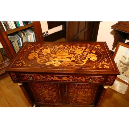 65 - A 19th century Dutch marquetry inlaid walnut sideboard, the top decorated with flowing basket of flo... 