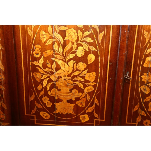 65 - A 19th century Dutch marquetry inlaid walnut sideboard, the top decorated with flowing basket of flo... 