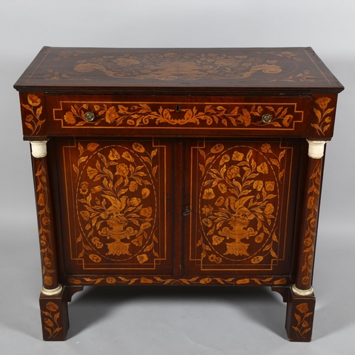 65 - A 19th century Dutch marquetry inlaid walnut sideboard, the top decorated with flowing basket of flo... 