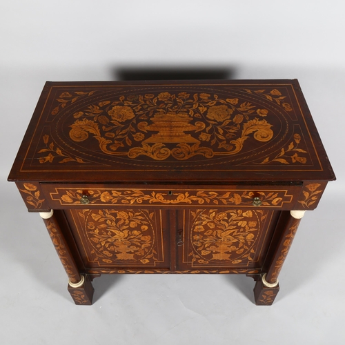 65 - A 19th century Dutch marquetry inlaid walnut sideboard, the top decorated with flowing basket of flo... 