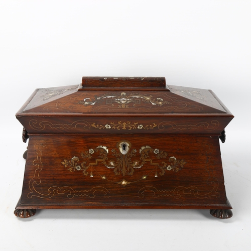 70 - A 19th century rosewood sarcophagus-shaped tea caddy, with inlaid brass and mother-of-pearl marquetr... 