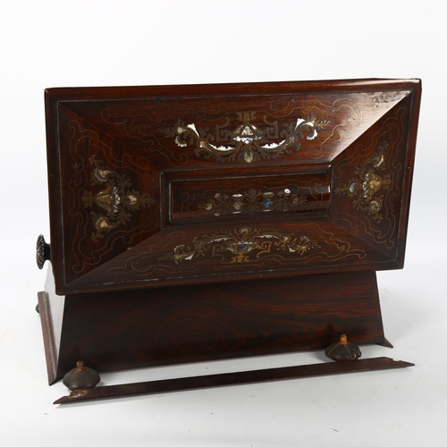 70 - A 19th century rosewood sarcophagus-shaped tea caddy, with inlaid brass and mother-of-pearl marquetr... 