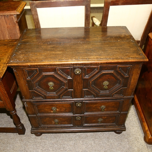 74 - An 18th century oak chest of 3 long drawers, with moulded panelled drawer fronts, width 88cm, depth ... 