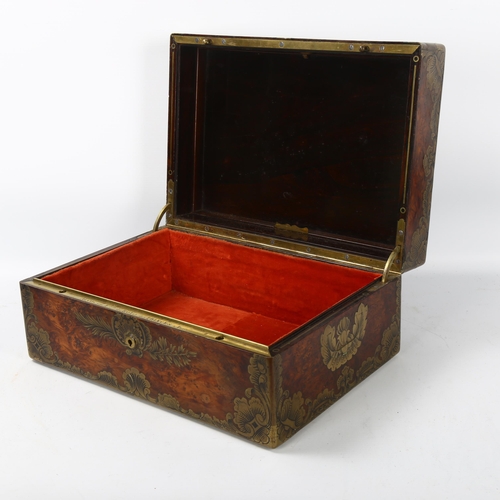 81 - 19th century French amboyna and brass-bound travelling case, armorial brass crest to the lid 