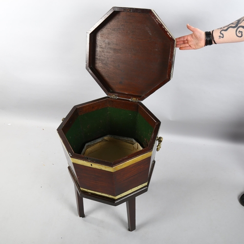 270 - A George III brass-bound mahogany wine cooler of octagonal form, brass drop handles, on separate sta... 