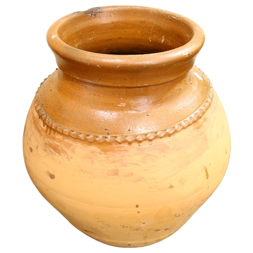 273 - A Mediterranean terracotta oil jar, height 58cm